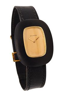 Boucheron Paris Wristwatch in 18kt gold with ebony wood