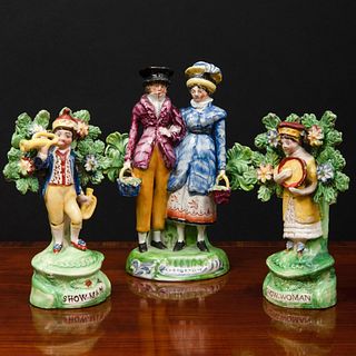 Pair of Staffordshire Pearl Glazed Earthenware Bocage Figures of 'Showmen' and a Pair of Dandies