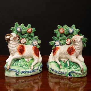 Pair of Staffordshire Pearl Glazed Earthenware Bocage Figures of an Ewe and Ram