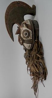 African carved and painted wood mask