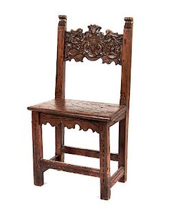 A Spanish Baroque Walnut Hall Chair Height 37 inches.