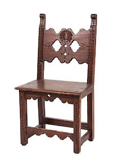 A Jacobean Style Walnut Hall Chair Height 37 3/4 inches.