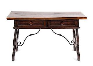 A Spanish Baroque Style Walnut Trestle Table Height 29 x width 49 1/4 x depth 24 1/2 inches.