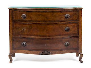A Continental Walnut Chest of Drawers Height 35 1/2 x width 48 x depth 19 1/2 inches.