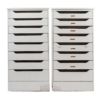A Pair of White Painted Banks of Drawers Height 60 1/2 x width 31 x depth 12 inches.