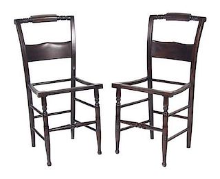 A Pair of Wooden Chairs Height 34 1/2 inches x width 17 1/4 inches x depth 14 inches.