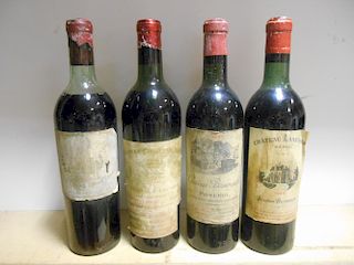 Seven older vintage clarets. Chateau La Tour Milon, Pauillac 1949 (top shoulder); Chateau Margaux 19