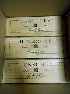 Henschke Hill of Grace Shiraz 2001, three bottles in individual wooden boxes. Removed from a College