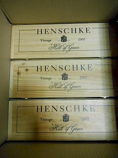 Henschke Hill of Grace Shiraz 2001, three bottles in individual wooden boxes. Removed from a College