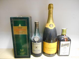Veuve Clicquot, one magnum; Courvoisier and Martell Cognac; Cointreau; Glenfiddich, three small size