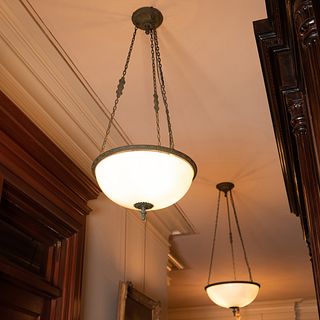 Pair of Patinated Metal-Mounted Glass Four-Light Chandeliers