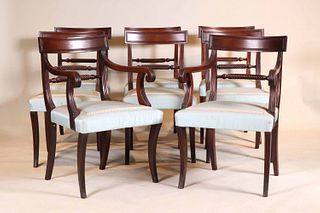 Eight Regency Carved Mahogany Dining Chairs