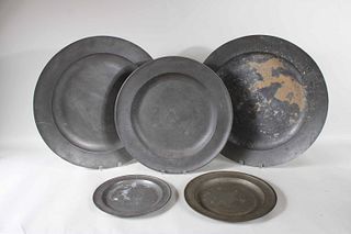 Five Pewter Plates and Chargers