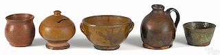 Five Pennsylvania redware articles 19th c., to include a bank, a sugar bowl, a miniature jug
