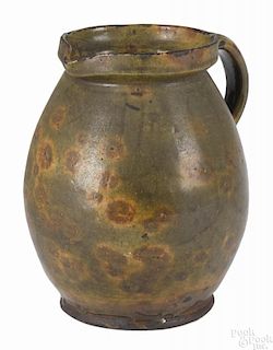 Gonic, New Hampshire redware pitcher, early 19th c., 8 1/4'' h.