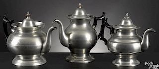 Three American pewter teapots, early/mid 19th c., bearing the touches of Roswell Gleason, Boardman