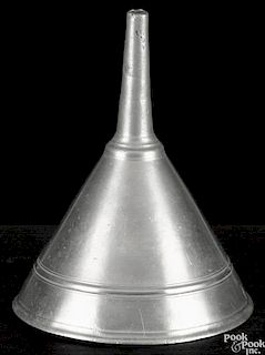 New York pewter funnel, ca. 1775, bearing the touch of Frederick Bassett, 7'' h., 5 3/4'' w.