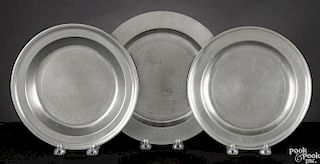 Three pewter plates, late 18th c., two with the Love touchmark, 8 1/2'' dia.