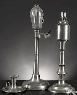Pewter timer lamp, 19th c., together with a Roswell Gleason candlestick, chamberstick and font