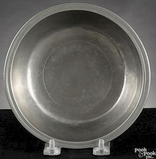 New York pewter basin, ca. 1775, bearing the touch of William Kirby, 1 5/8'' h., 6 5/8'' w.