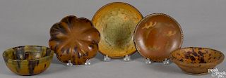 Two Pennsylvania redware food molds, 19th c., together with two shallow bowls