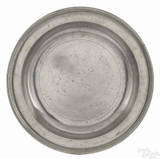 New York pewter deep dish, ca. 1780, bearing the touch of Frederick Bassett, 16 3/8'' dia.