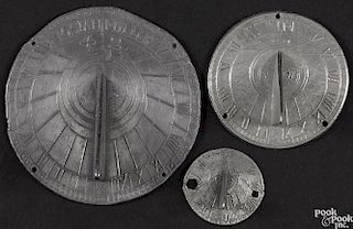 Three small pewter sundials, 18th/19th c., the largest signed Iosiah Miller, 4 1/2'' dia.
