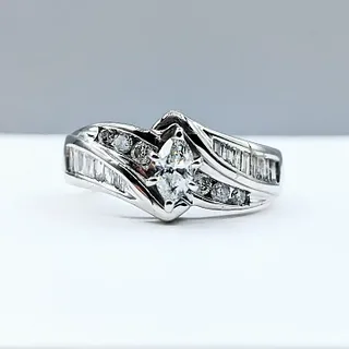 Marquise, Round & Baguette Cut Diamond Engagement Ring