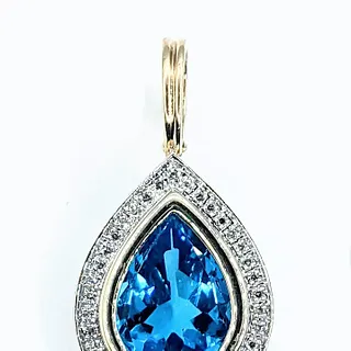 Vivid Blue Topaz & Diamond Pendant