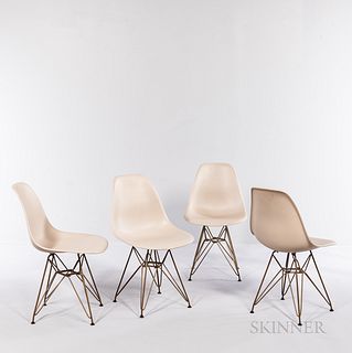Four Eames-style Shell Chairs with Eiffel Tower Bases