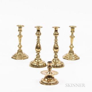 Two Pairs of Brass Candlesticks and a Low Brass Candlestick