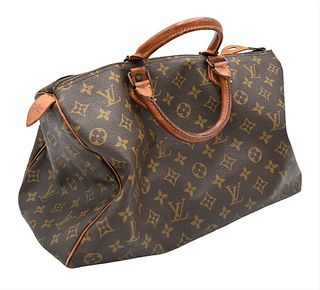 Vintage Louis Vuitton Bag, canvas with LV monogram and tan leather handles, length 14.5 inches.