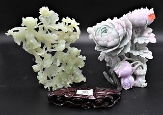 Two Carved Stone Chinese Pieces, jadeite lotus group with hues of purple and green along with a carved green figural group, 8 1/2 inches and 8 1/4 inc