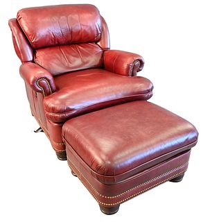 Hancock and Moore Leather Upholstered Easy Chair, with matching ottoman, height 36 inches, width 35 inches.
