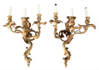 Pair of French Bronze Candle Sconces, each having three lights, height 19 inches.