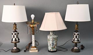 Four Table Lamps, to include a pair of blue and white porcelain oil lamps, Chinese style lamp, and a Victorian oil lamp on marble base, tallest 33 inc