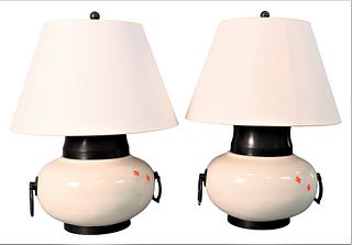 Pair of Chinese Style White and Black Ceramic Table Lamps, having ring handles (staining to one shade), total height 29 inches.