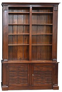Large Mahogany Classical Bookcase, having two door bottom with shelf top, height 103 inches, width 68 inches, depth 17 inches.