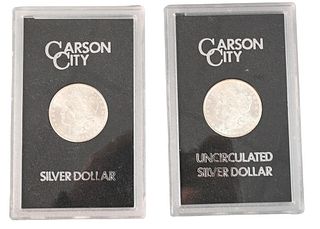 Two 1882 Carson City Morgan Silver Dollars.