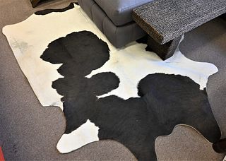 Three Cowhide Rugs, each approximately 81” x 70”.