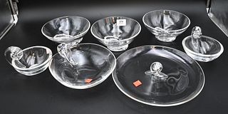 Group of Seven Steuben Glass Pieces, set of three matching bowls, two small bowls, with a matching larger bowl along with a round tray, all signed Ste