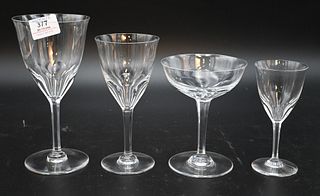 Set of Zurich Pattern Baccarat Crystal Stems, to include eight red wine glasses, seven white wine, eight champagne, and eight small wine, heights 5 3/