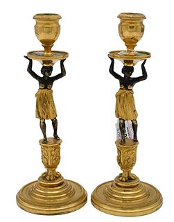 Pair of French Bronze Figural Candlesticks, each having nude female shaft, standing on a pedestal with claw feet on circular base, height 8 1/4 inches