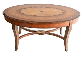 Maitland Smith Oval Coffee Table, having burlwood top and X stretcher base, height 20 inches, top 28" x 42".