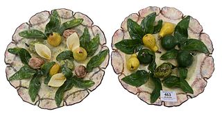 Two Christine Viennet Ceramic Plates, having fruit, vegetable, leaves, flowers and nuts, signed Christine Viennet, France on back, diameter 10 inches,
