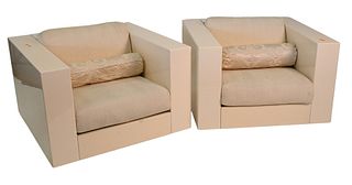 Pair of White Lacquered Modern Club Chairs, ivory or off white with upholstered cushions, height 24 inches, width 35 inches, depth 35 inches.