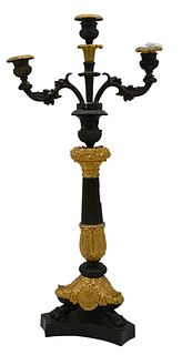 French Empire Gilt and Patinated Bronze Candelabra, having two arms with center candle holders on tripod claw foot base, (missing arm), height 20 inch