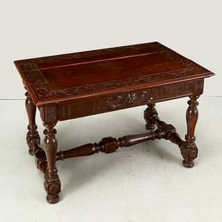 Renaissance Revival carved oak library table