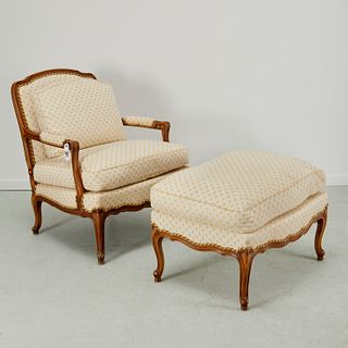 Louis XV style walnut fauteuil and ottoman