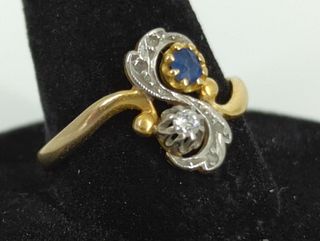 18kt Yellow Gold Ring With A Blue Gemstone & Clear Diamond Accents